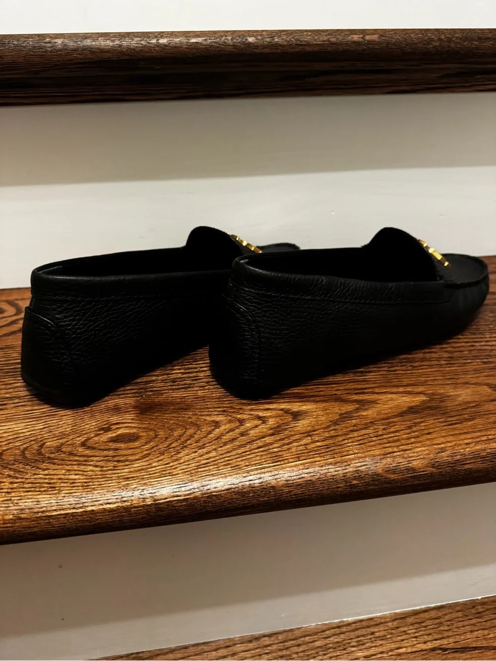 Like New Tory Burch Black Leather Loafers with Gold Logo Plaques